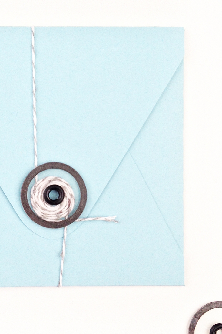 DIY Stationery: This tutorial shows you how you can create and add your own transparent button and string closures to your pretty envelopes. Click through to make your own on Maritza Lisa!