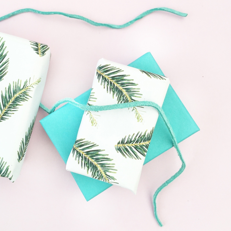DIY Holiday Gift Wrap - Maritza Lisa: Create your own Christmas wrapping paper with leftover tree clippings. Click through to learn more!
