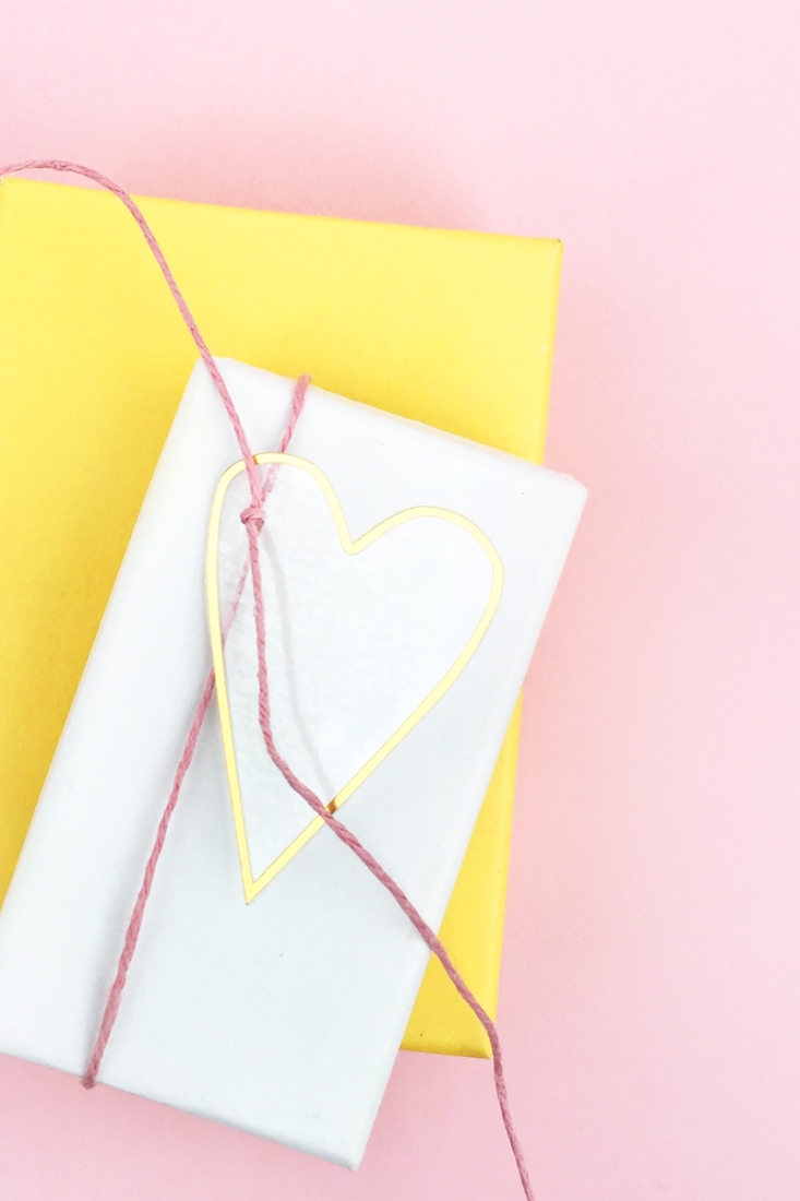 DIY Minimal Gold Heart Tags - Maritza Lisa: Create these pretty transparent heart tags with gold details for your favorite people. Click through for the tutorial...