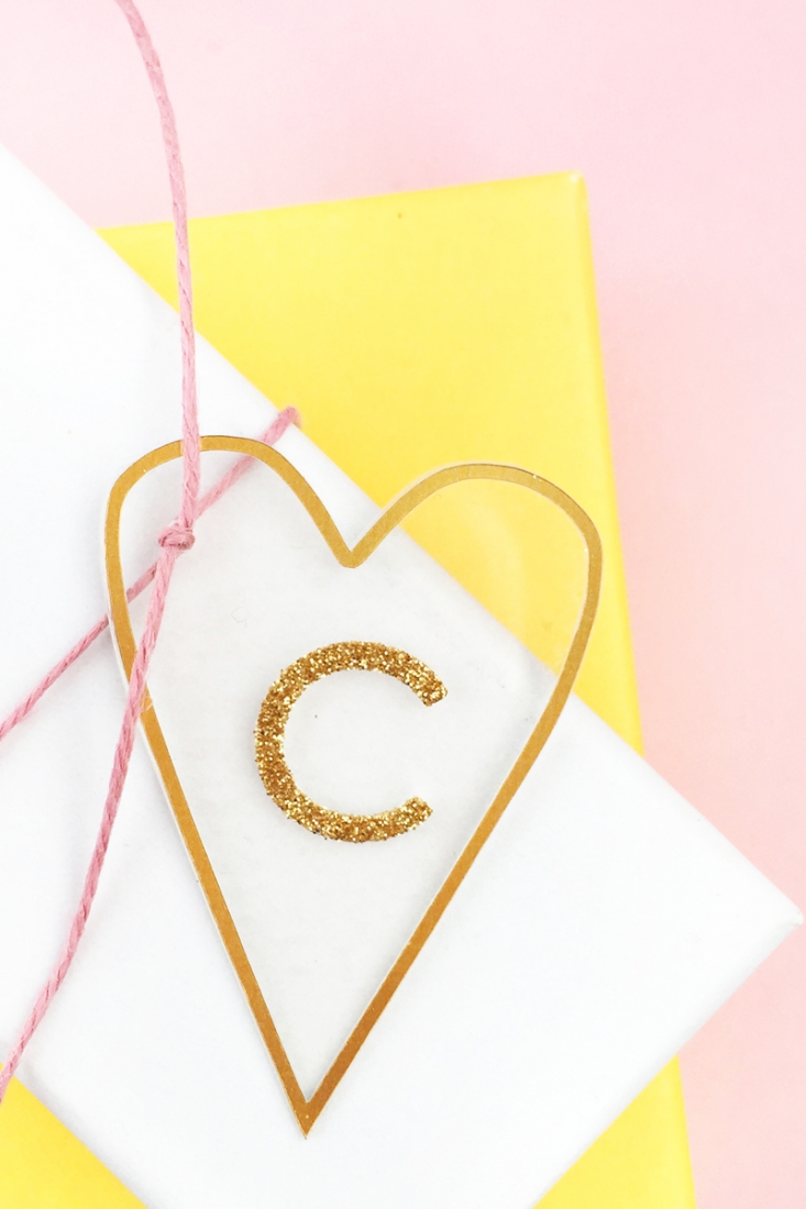 DIY Minimal Gold Heart Tags - Maritza Lisa: Create these pretty transparent heart tags with gold details for your favorite people. Click through for the tutorial...