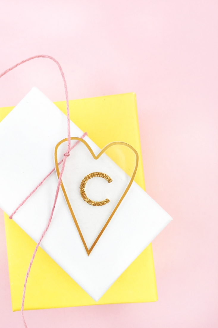 DIY Minimal Gold Heart Tags - Maritza Lisa: Create these pretty transparent heart tags with gold details for your favorite people. Click through for the tutorial...