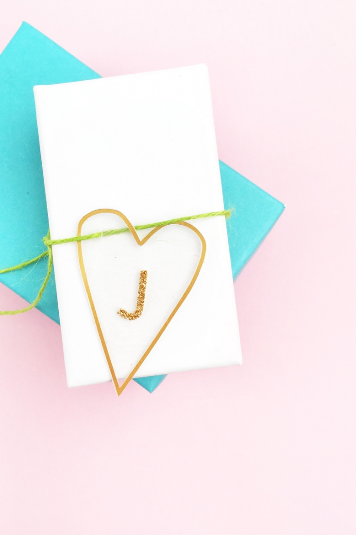 DIY Minimal Gold Heart Tags - Maritza Lisa: Create these pretty transparent heart tags with gold details for your favorite people. Click through for the tutorial...