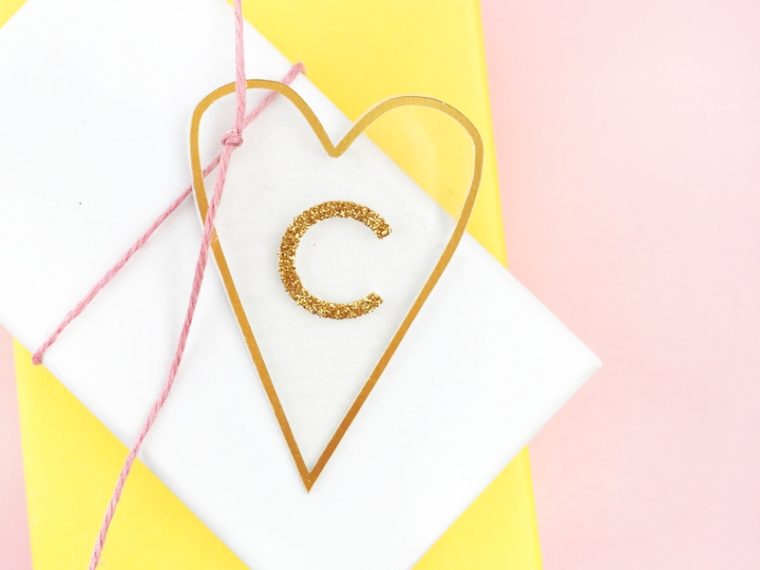 DIY Minimal Gold Heart Tags - Maritza Lisa: Create these pretty transparent heart tags with gold details for your favorite people. Click through for the tutorial...