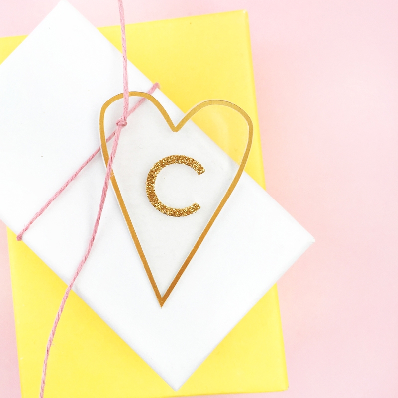 DIY Minimal Gold Heart Tags - Maritza Lisa: Create these pretty transparent heart tags with gold details for your favorite people. Click through for the tutorial...