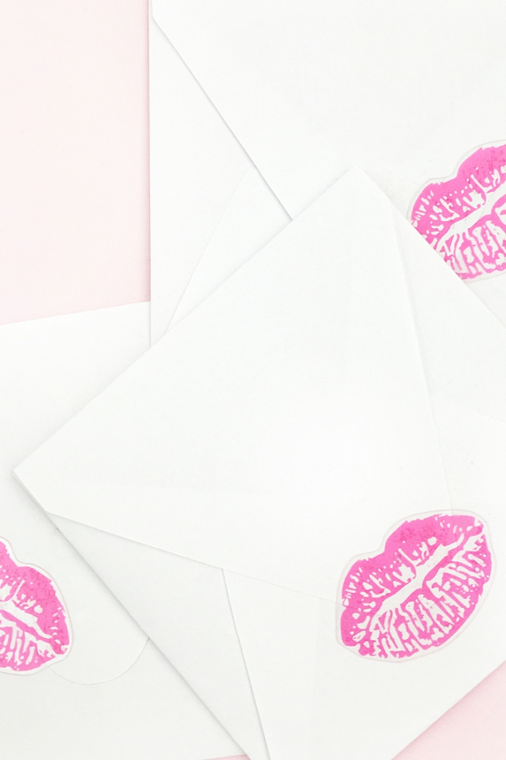 DIY Kissy Lips Seals - Maritza Lisa: Seal your envelopes with a kiss this Valentines with clear sticker paper. Click through for the tutorial...