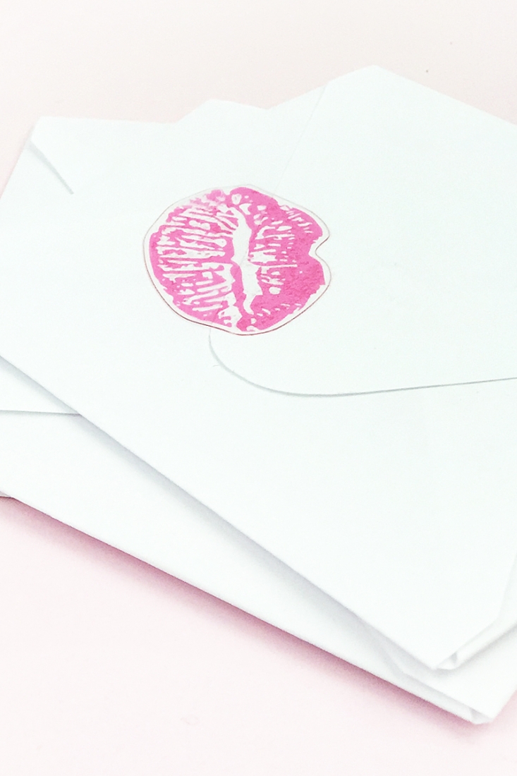 DIY Kissy Lips Seals - Maritza Lisa: Seal your envelopes with a kiss this Valentines with clear sticker paper. Click through for the tutorial...