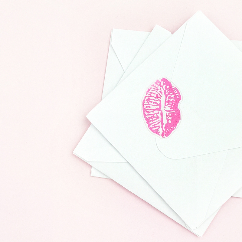 DIY Kissy Lips Seals - Maritza Lisa: Seal your envelopes with a kiss this Valentine's with clear sticker paper. Click through for the tutorial...