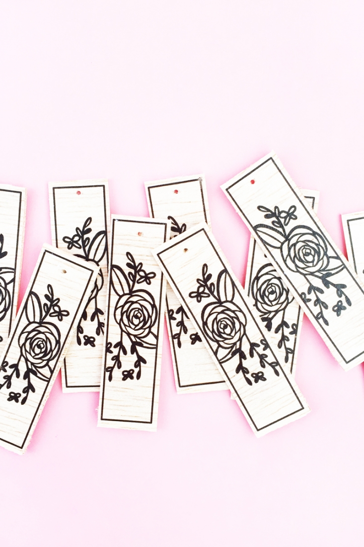 DIY Floral Wood Tags on Maritza Lisa - These floral tags were made with balsa wood, a floral image and Silhouette America's tattoo paper. Click through to make your own!