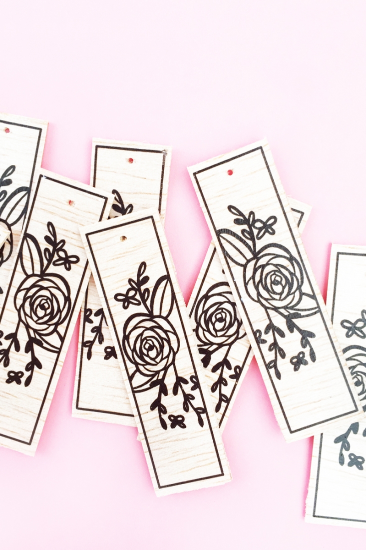 DIY Floral Wood Tags on Maritza Lisa - These floral tags were made with balsa wood, a floral image and Silhouette America's tattoo paper. Click through to make your own!