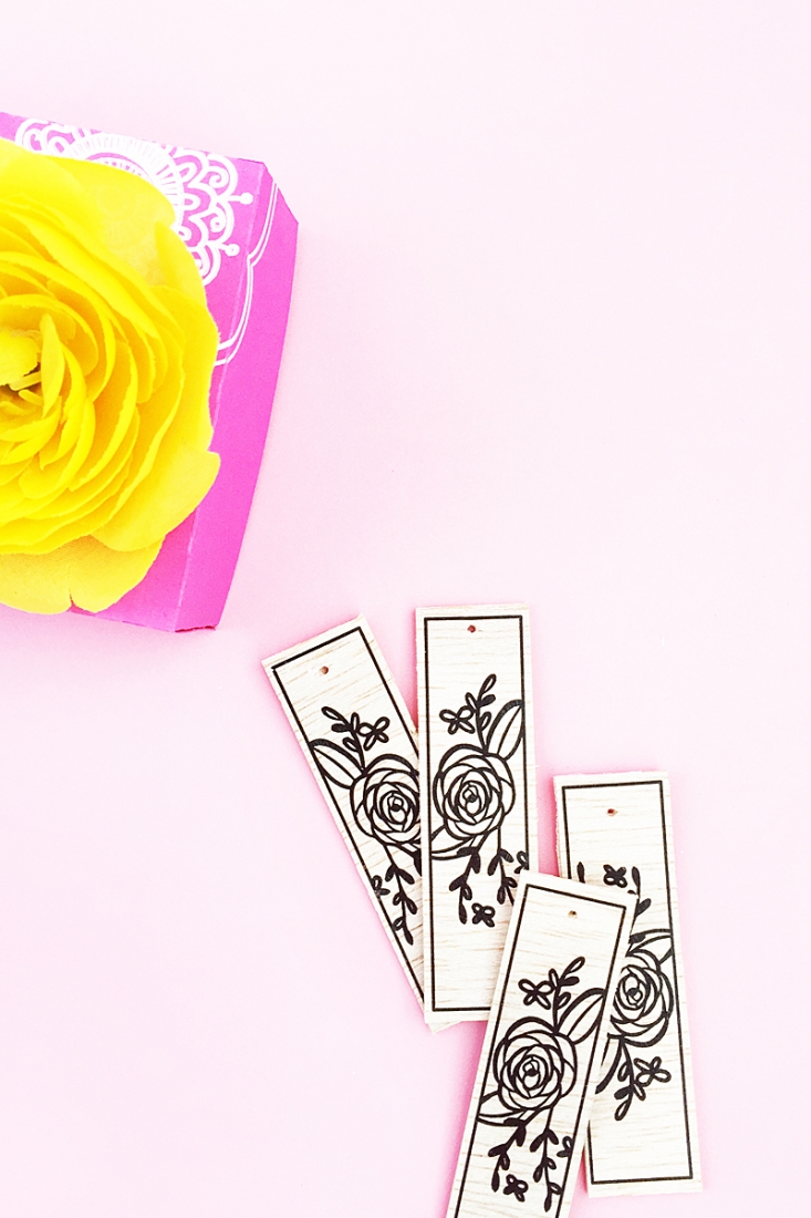 DIY Floral Wood Tags on Maritza Lisa - These floral tags were made with balsa wood, a floral image and Silhouette America's tattoo paper. Click through to make your own!