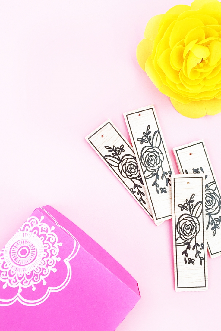 DIY Floral Wood Tags on Maritza Lisa - These floral tags were made with balsa wood, a floral image and Silhouette America's tattoo paper. Click through to make your own!