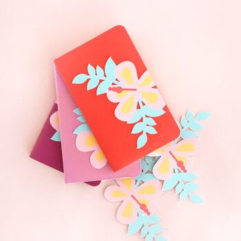Mini DIY Hibiscus Journals - Decorate your planners, journals and notebooks with these pretty tropical hibiscus flowers. Click through for the tutorial!