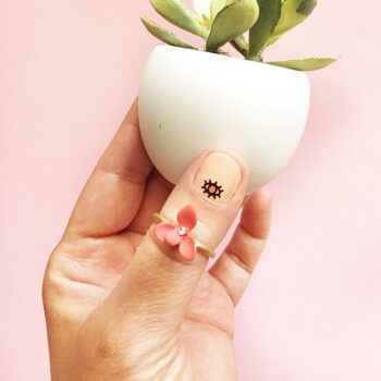 Looking to DIY your own Nail Art from the latest in Nail Trends? Try adding Minimalist Accents to nude colored nails with temporary tattoos!