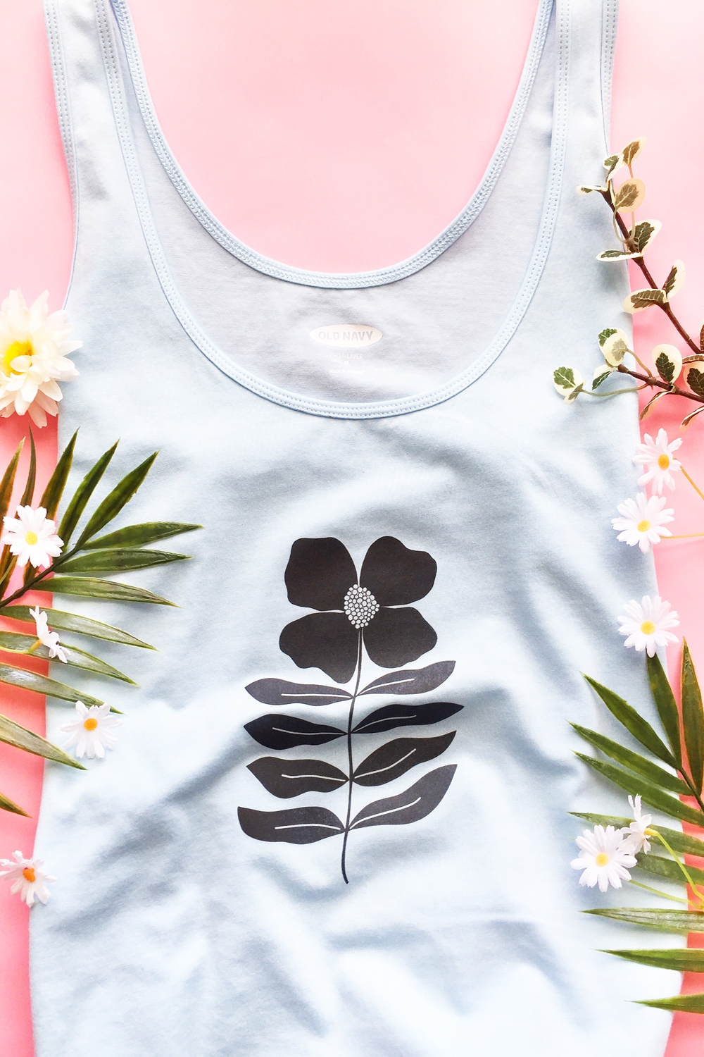 How To Make A DIY Flower Tank Top - This tutorial on Maritza Lisa will show you how to customize a tank with a flower image